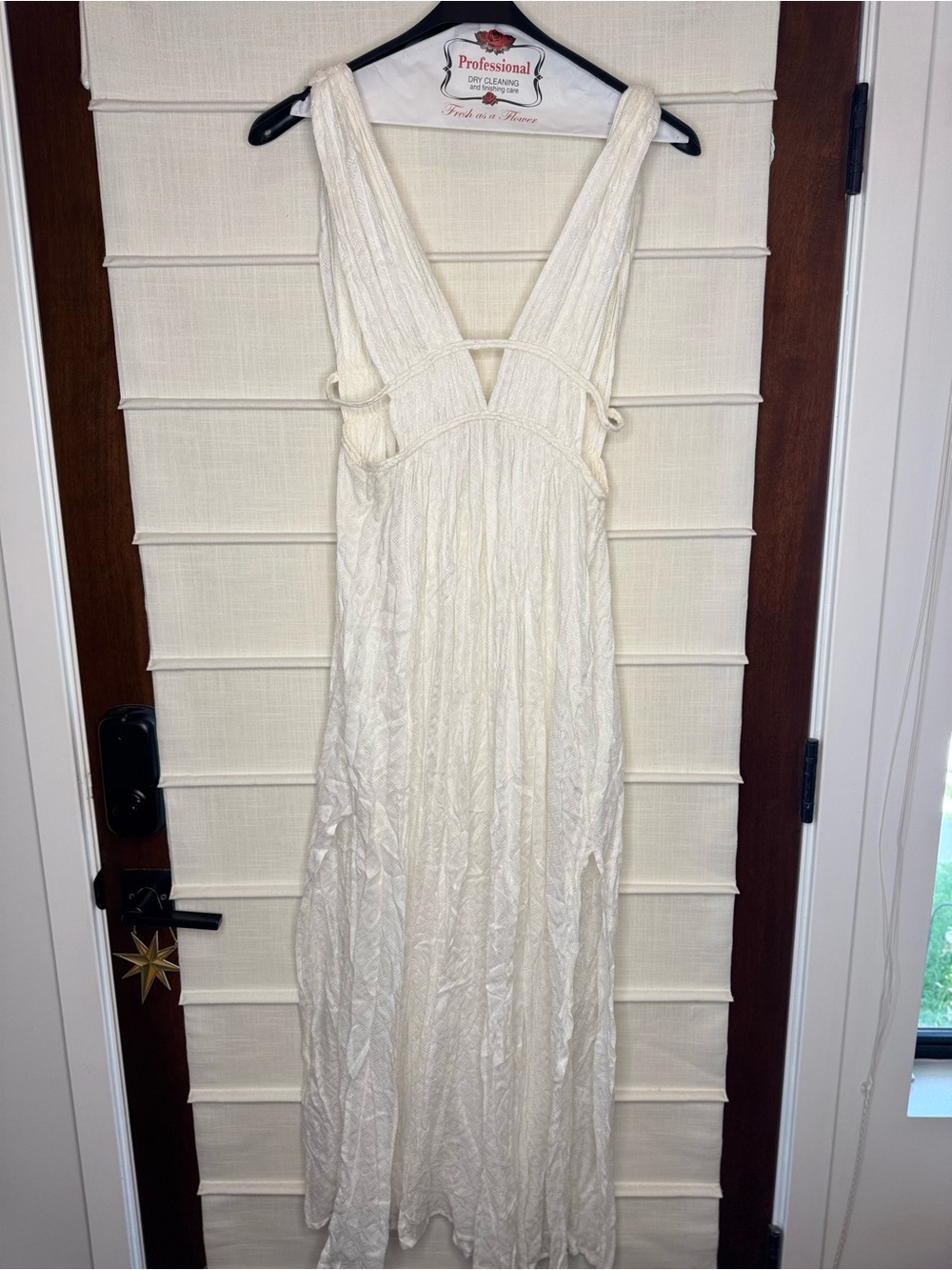Nomadica White V-Neck Sleeveless Flowy Maxi Dress
